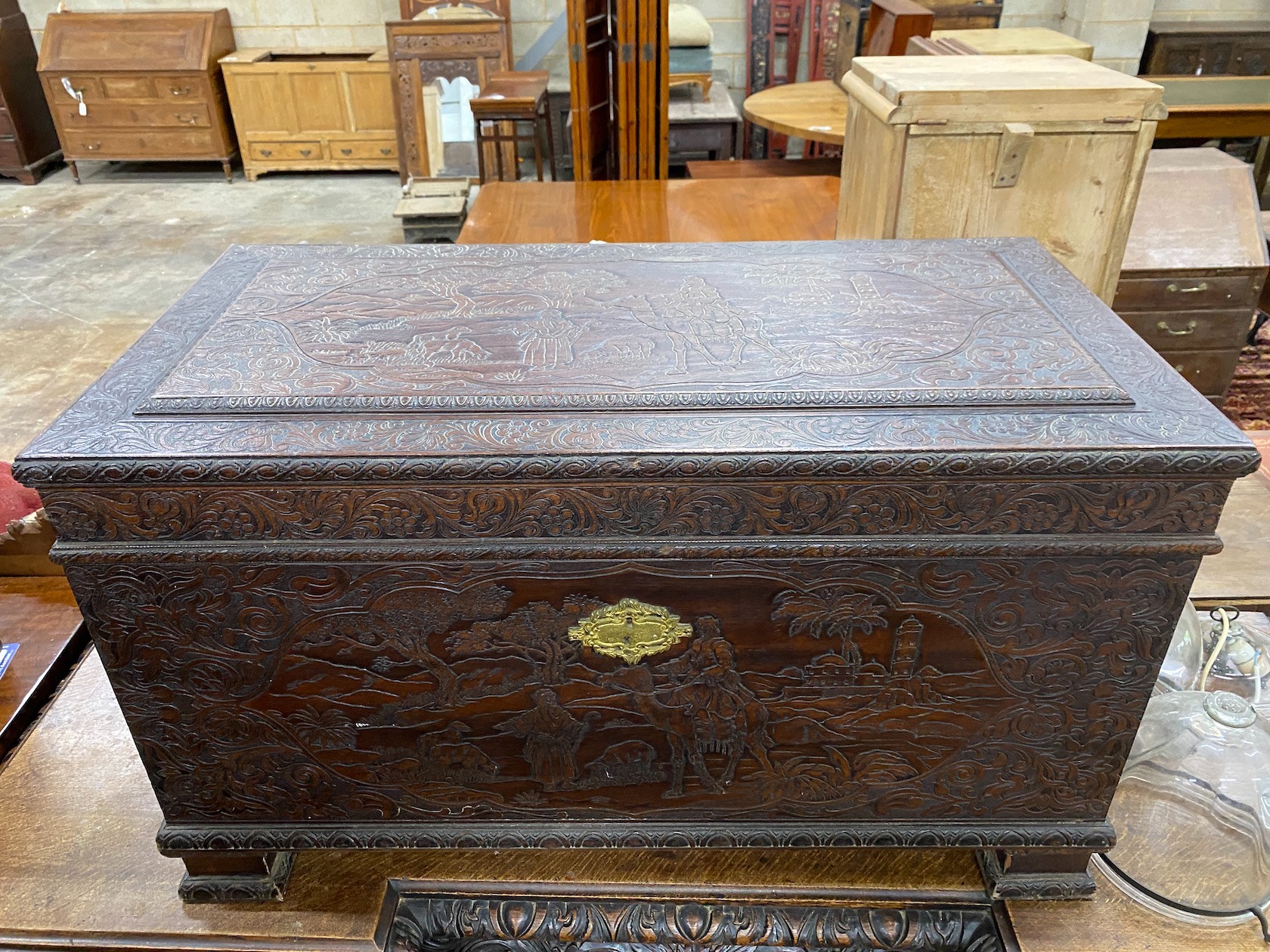 A carved teak coffer, length 101cm, depth 52cm, height 58cm
